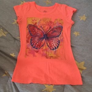 I am selling this shirt with a butterfly on .